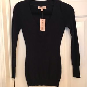 NWT navy blue sweater.